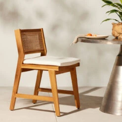 Merit Teak Wood & Woven Cane Outdoor Dining Chair With Cushion -Famous Furniture Shop 234354 001 ESS 1 93464.1680108306