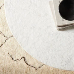 Felix Sandblasted White Marble Round Coffee Table 48" -Famous Furniture Shop ISD 0199 DET 10 79521.1707485554